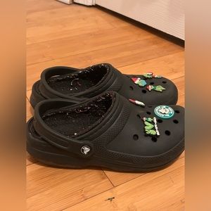 Black crocs with charms